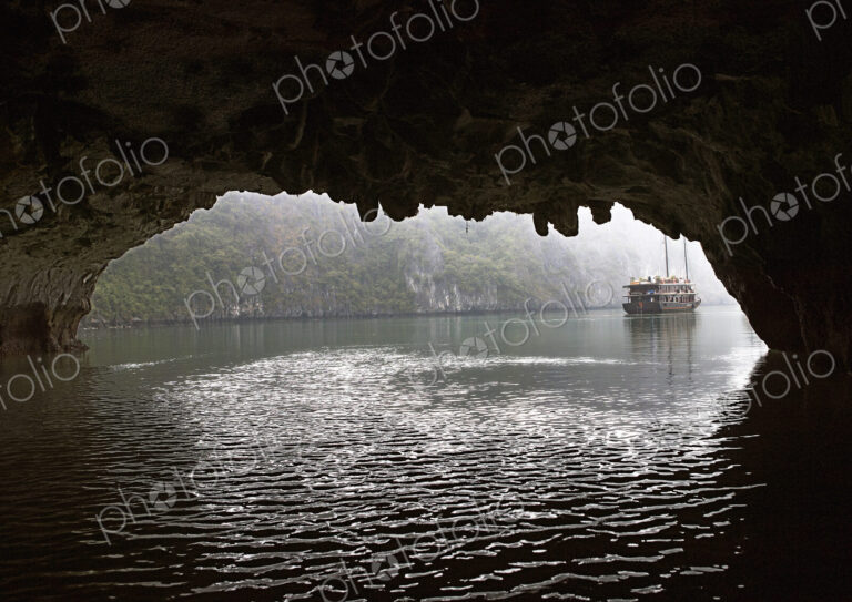 Chinese Junk Seen Through a Cave Entrance