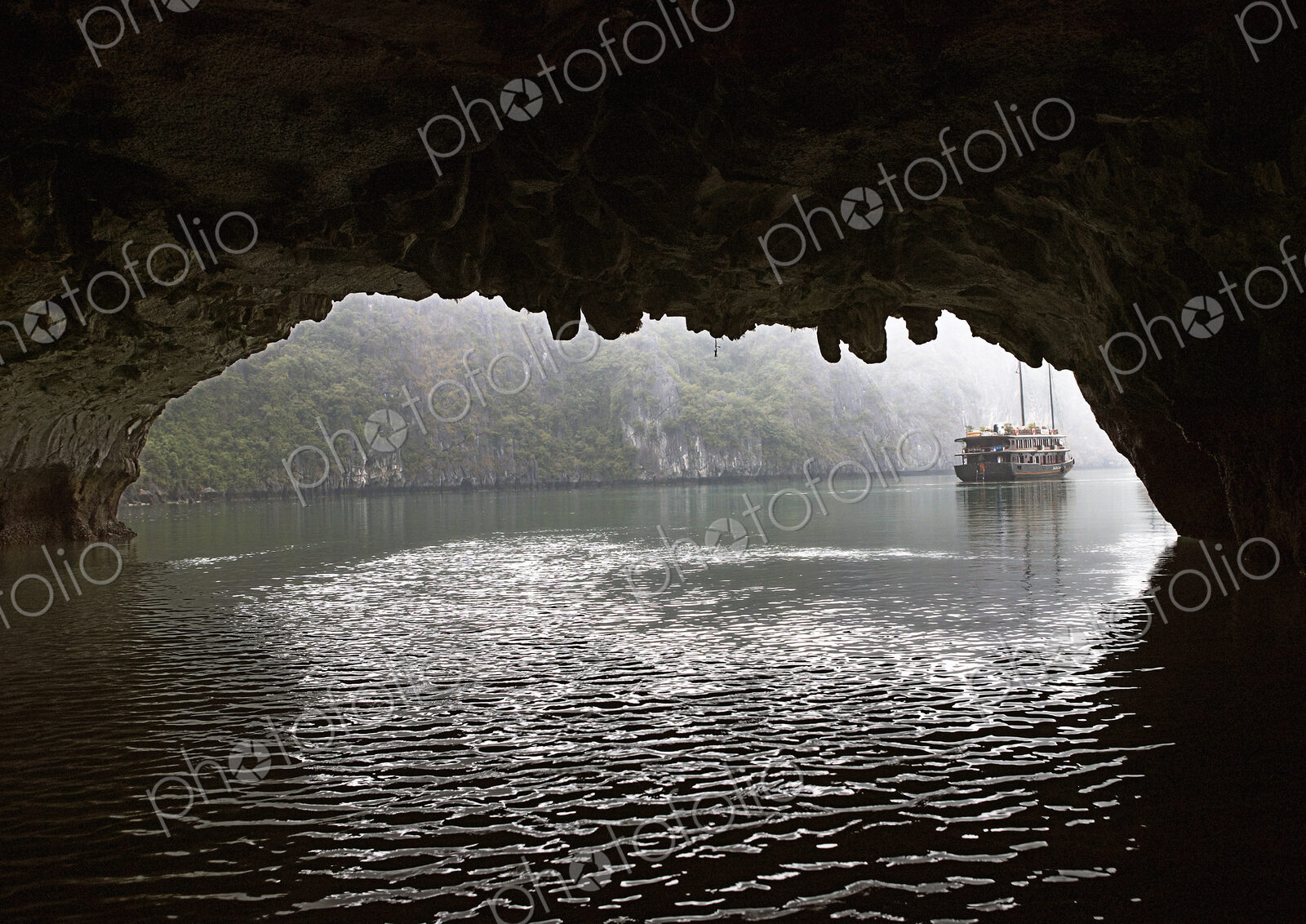 Chinese Junk Seen Through a Cave Entrance