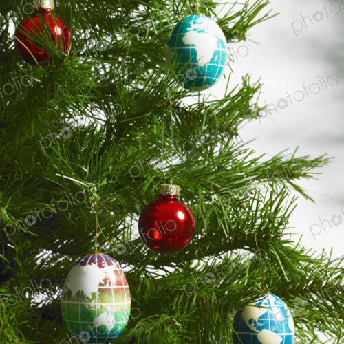Christmas decorations, small group of red and blue tree ornaments on a tree Christmas decorations, small group of red and blue tree ornaments on a tree