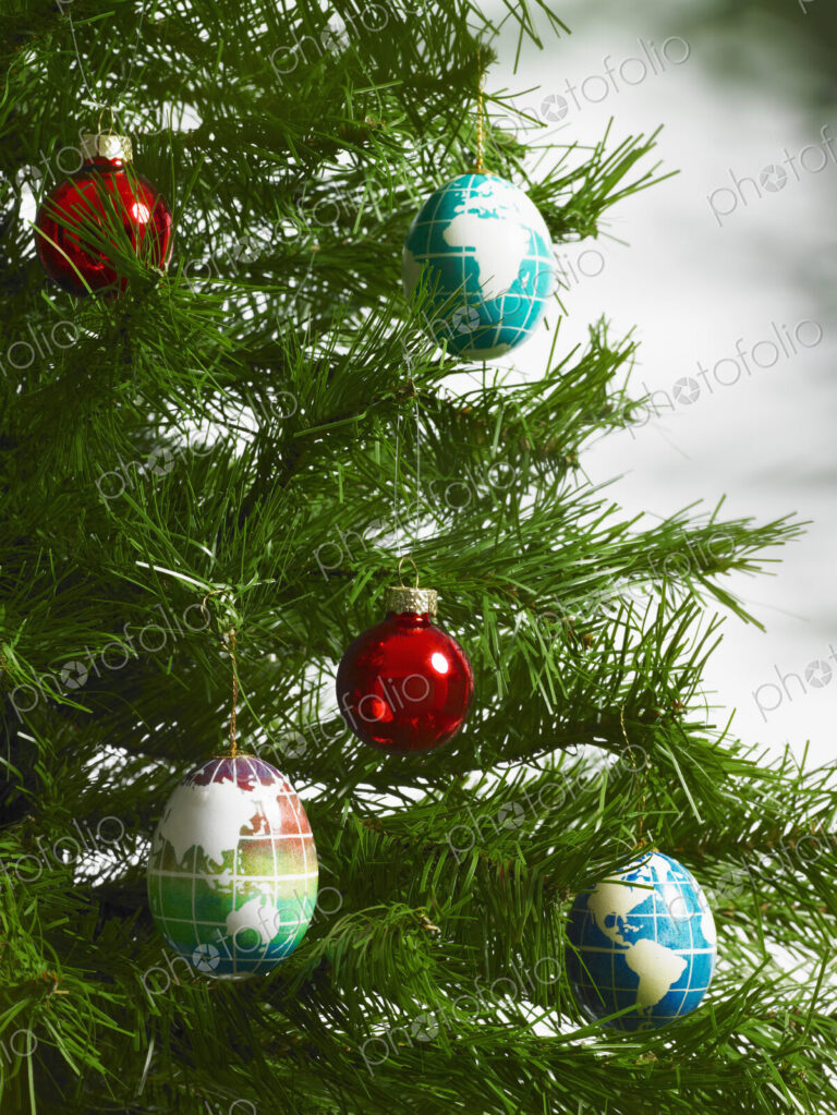 Christmas decorations, small group of red and blue tree ornaments on a tree