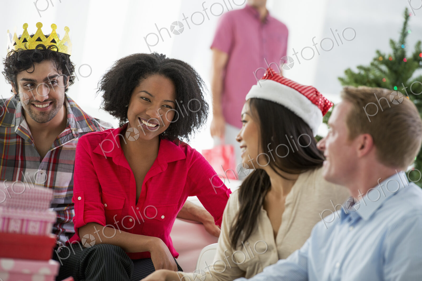 Christmas time. Celebrating the holidays. A woman wearing a red and white Father…