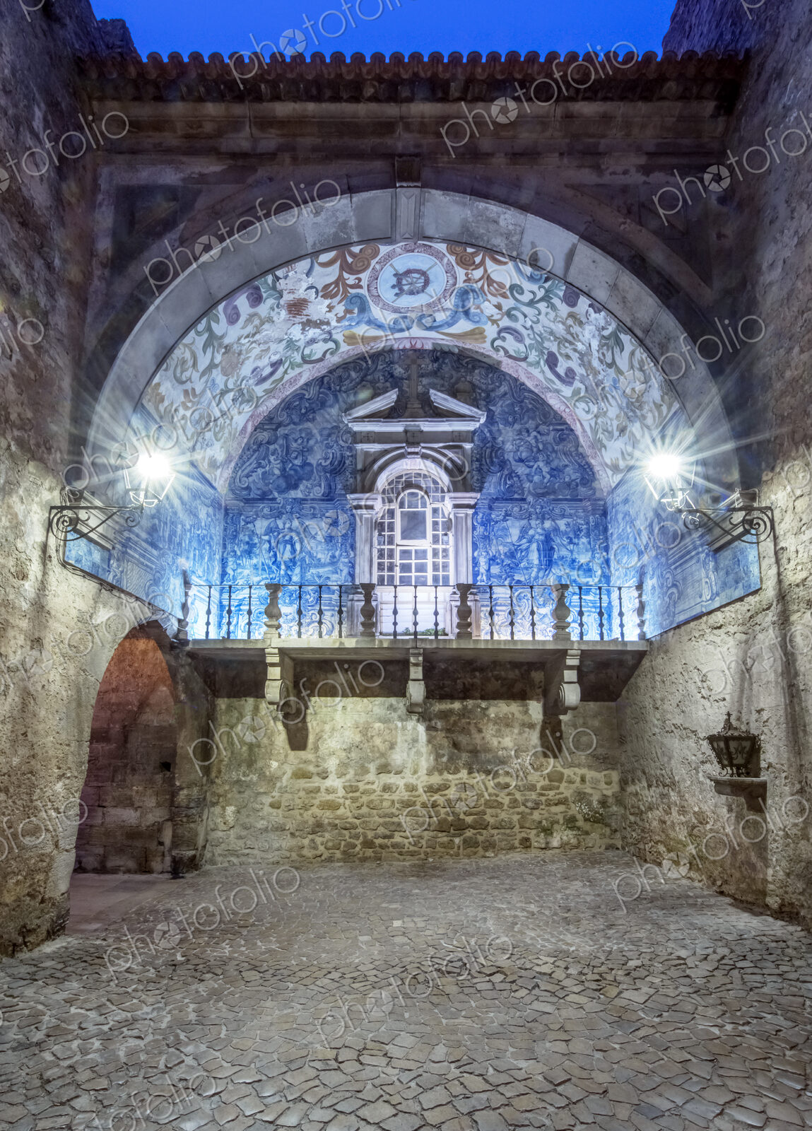 Church arch illuminated at night, Obidos, Leiria, Portugal