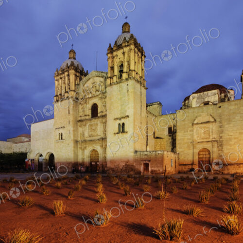 Church or castle lit up at dusk.