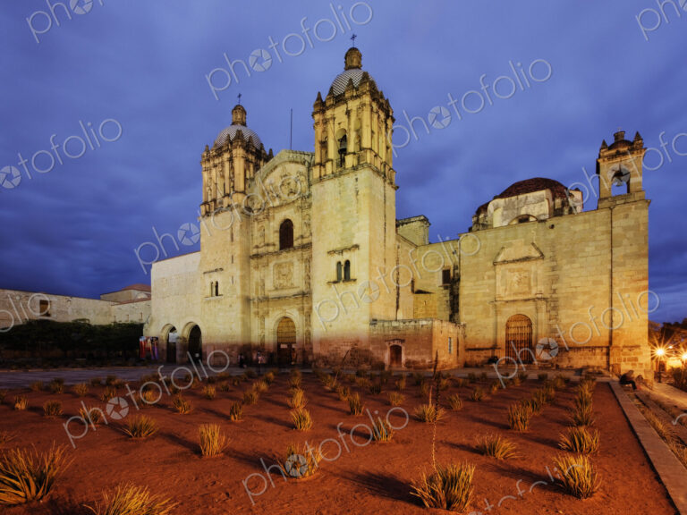 Church or castle lit up at dusk.