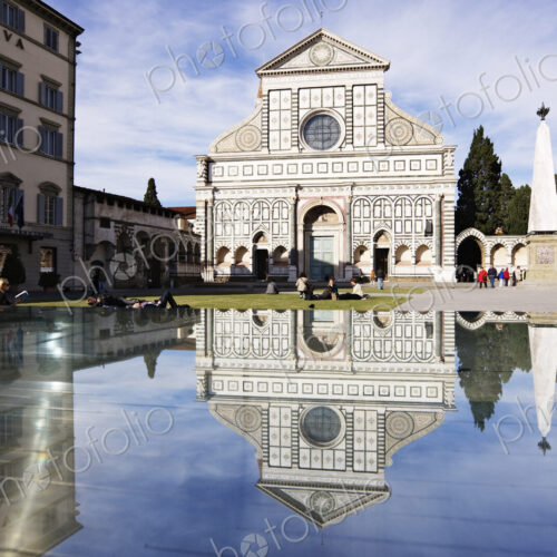 Church reflected in pond in town square. Church reflected in pond in town square.