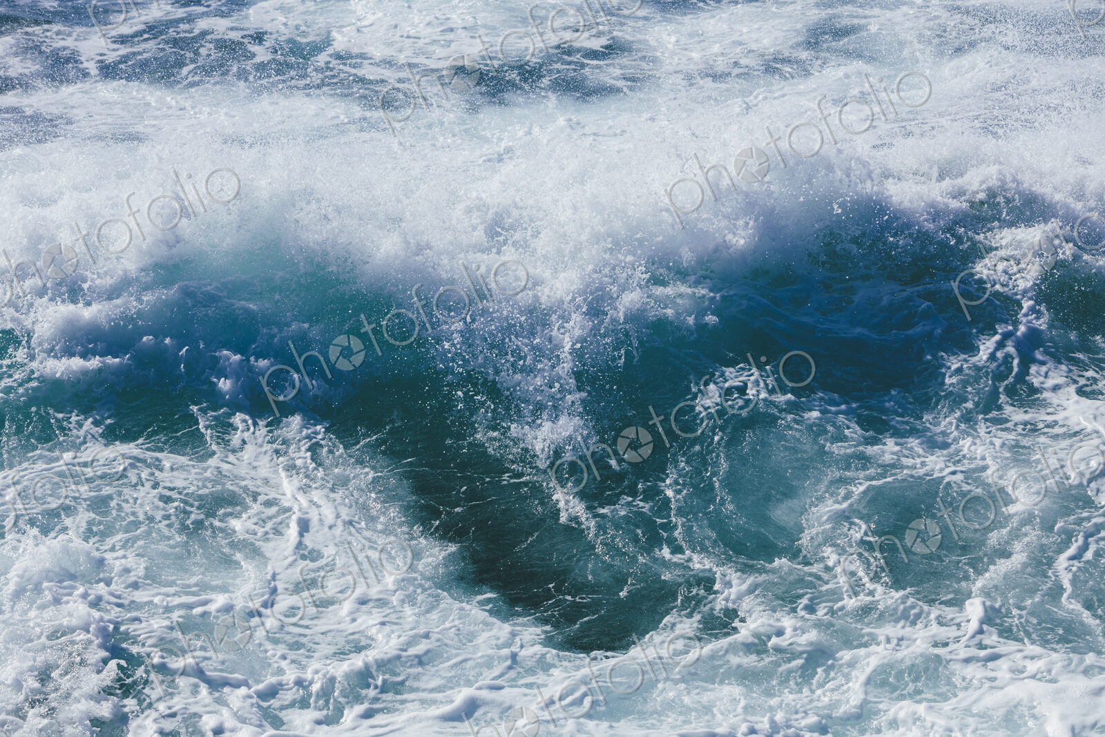 Churning ocean water and waves, high angle view