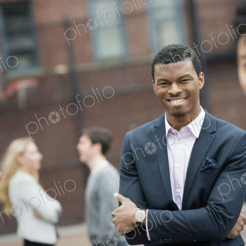 City life in spring. Young people outdoors in a city park. Two people in the… City life in spring. Young people outdoors in a city park. Two people in the…