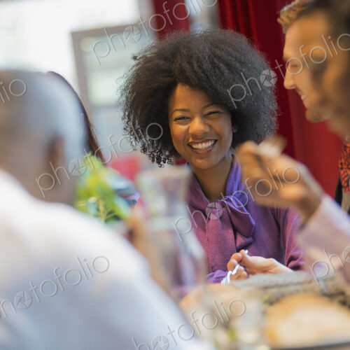City life. A group of people in a coffee shop, one using a mobile phone, and others… City life. A group of people in a coffee shop, one using a mobile phone, and others…