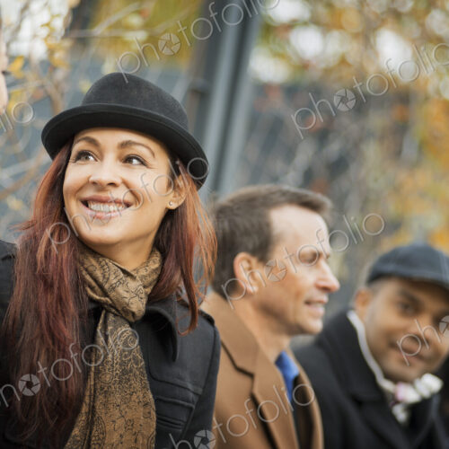 City life. A group of people on the go, keeping in contact, using mobile phones, and… City life. A group of people on the go, keeping in contact, using mobile phones, and…