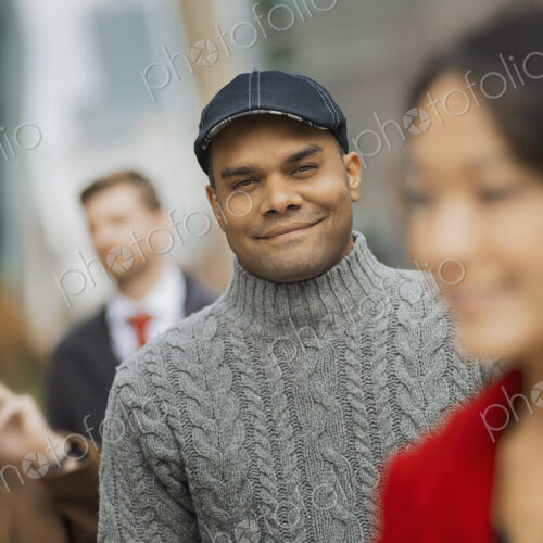 City life. A group of people on the go, keeping in contact, using mobile phones, and… City life. A group of people on the go, keeping in contact, using mobile phones, and…