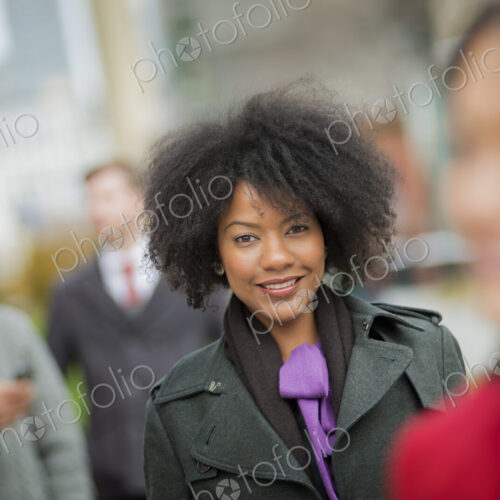City life. A group of people on the go, keeping in contact, using mobile phones, and… City life. A group of people on the go, keeping in contact, using mobile phones, and…
