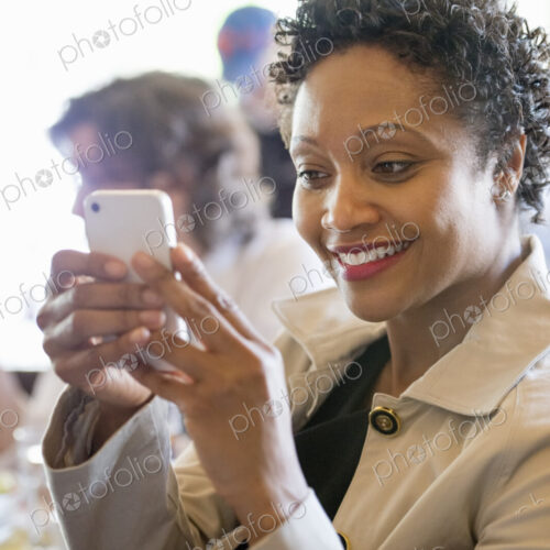 City life. A group of people sitting in a cafe or bar around a table. Men and women… City life. A group of people sitting in a cafe or bar around a table. Men and women…