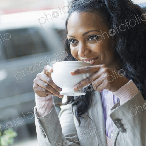 City life. Two people sitting in a coffee shop at a table. Man and woman. City life. Two people sitting in a coffee shop at a table. Man and woman.