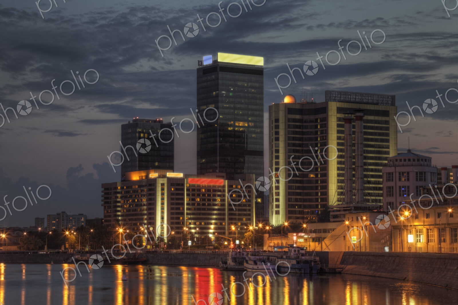 City skyline illuminated at night, Moscow, Russia