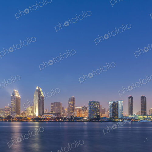 City skyline lit up at night, San Diego, California, United States City skyline lit up at night, San Diego, California, United States