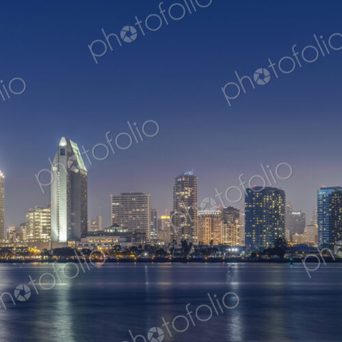 City skyline lit up at night, San Diego, California, United States City skyline lit up at night, San Diego, California, United States