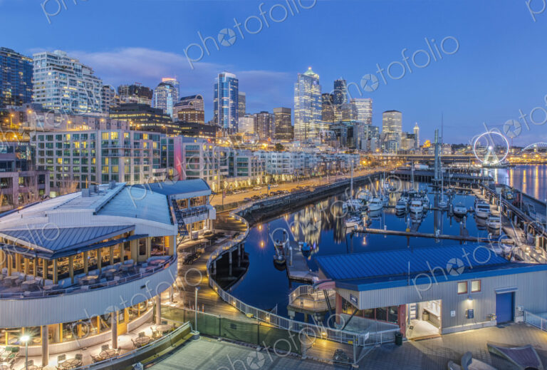 City skyline lit up at night, Seattle, Washington, United States