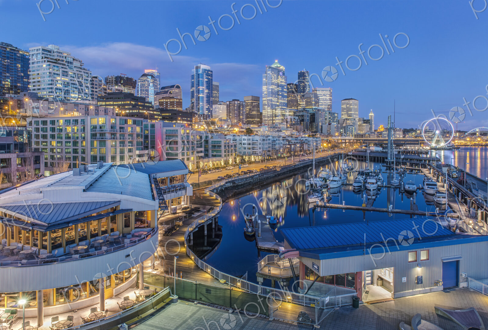 City skyline lit up at night, Seattle, Washington, United States