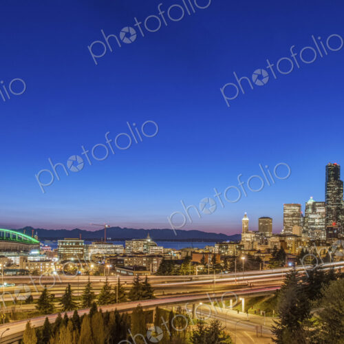 City skyline lit up at night, Seattle, Washington, United States City skyline lit up at night, Seattle, Washington, United States
