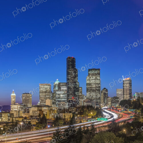 City skyline lit up at night, Seattle, Washington, United States City skyline lit up at night, Seattle, Washington, United States