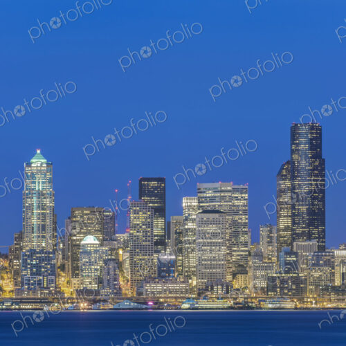 City skyline lit up at night, Seattle, Washington, United States City skyline lit up at night, Seattle, Washington, United States