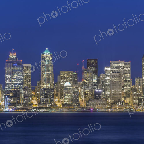 City skyline lit up at night, Seattle, Washington, United States City skyline lit up at night, Seattle, Washington, United States