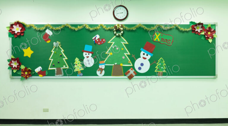 Classroom chalkboard decorated for Christmas