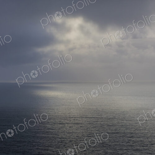 Clearing storm over vast ocean at dusk, Oregon