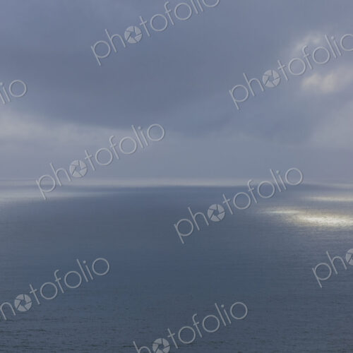 Clearing storm over vast ocean at dusk, Oregon