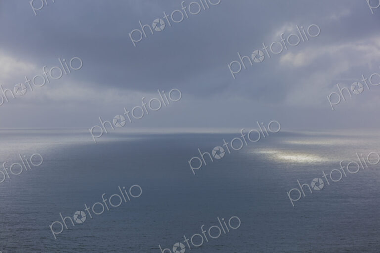 Clearing storm over vast ocean at dusk, Oregon