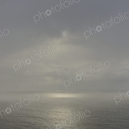 Clearing storm over vast ocean at dusk, Oregon