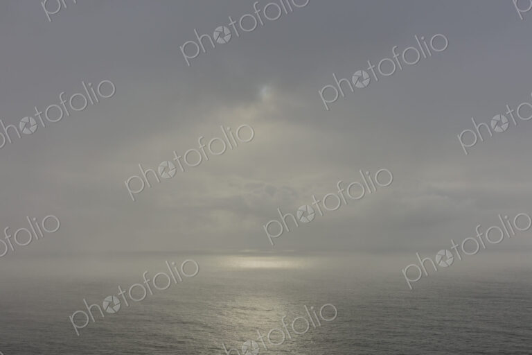 Clearing storm over vast ocean at dusk, Oregon