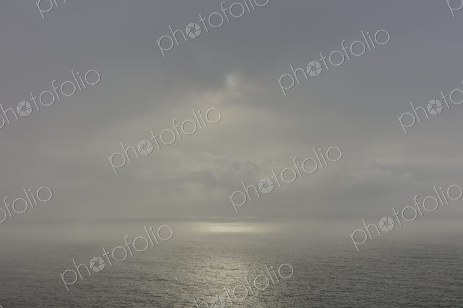 Clearing storm over vast ocean at dusk, Oregon