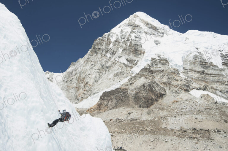 Climber using rope on mountain, Everest, Khumbu region, Nepal