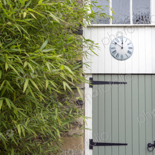 Clock on converted barn door Clock on converted barn door