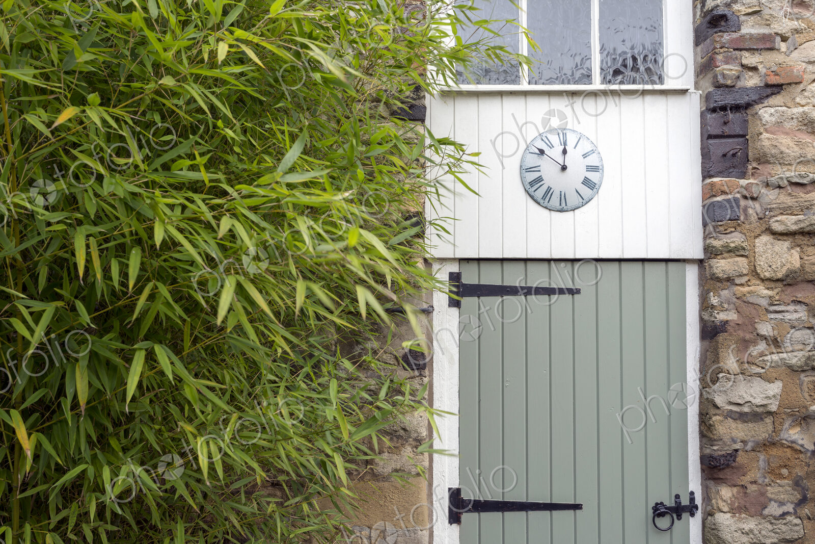 Clock on converted barn door