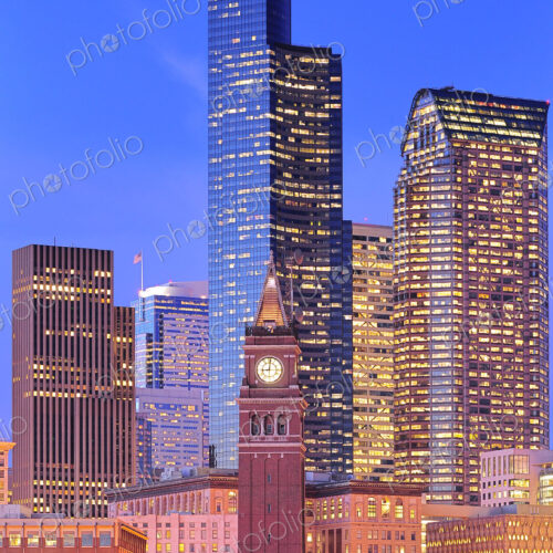 Clock tower and illuminated high rise buildings in Seattle city skyline, Washington,… Clock tower and illuminated high rise buildings in Seattle city skyline, Washington,…