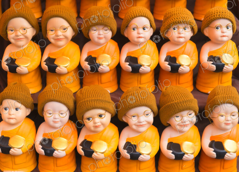 Close up of Buddhist monk dolls