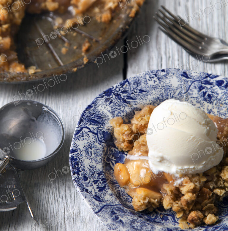 Close up of Dutch apple pie and ice cream