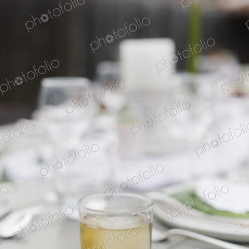 Close up of a drink on a table in a garden. Close up of a drink on a table in a garden.
