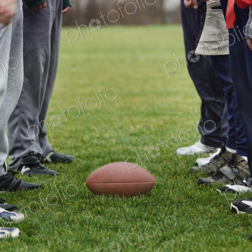 Close up of a friends getting ready for an American Flag Football game. Close up of a friends getting ready for an American Flag Football game.