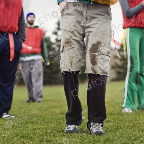 Close up of a friends getting ready for an American Flag Football game. Close up of a friends getting ready for an American Flag Football game.
