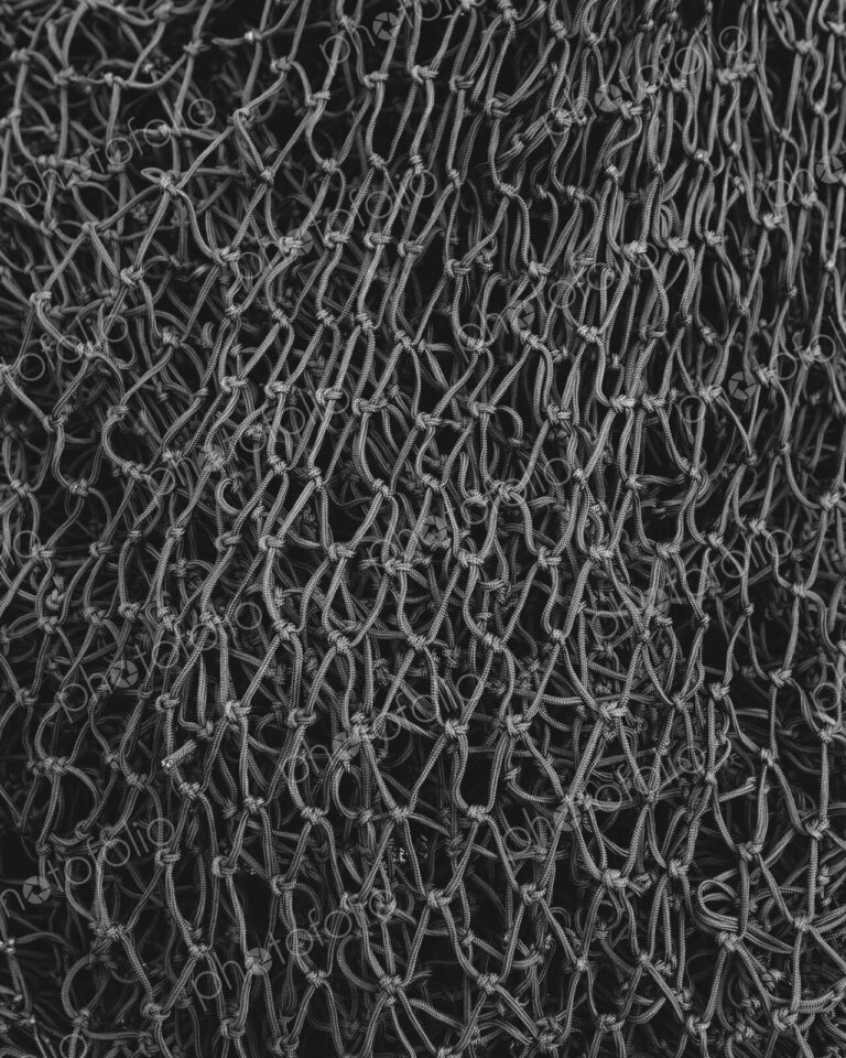 Close up of a grey commercial fishing nets.