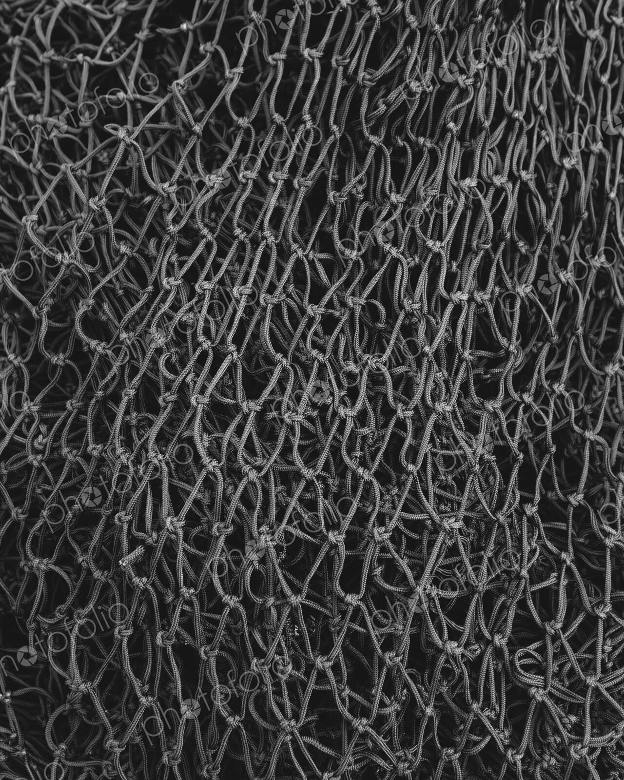 Close up of a grey commercial fishing nets.