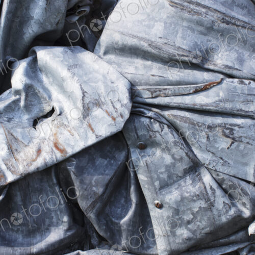 Close up of a pile of dented, crumpled and rusty metal. Close up of a pile of dented, crumpled and rusty metal.