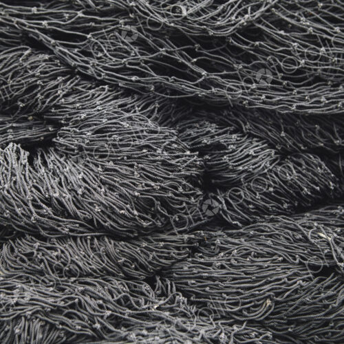 Close up of a pile of tangled up commercial fishing nets. Close up of a pile of tangled up commercial fishing nets.