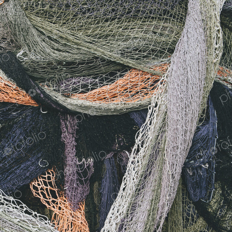 Close up of a pile of tangled up commercial fishing nets.