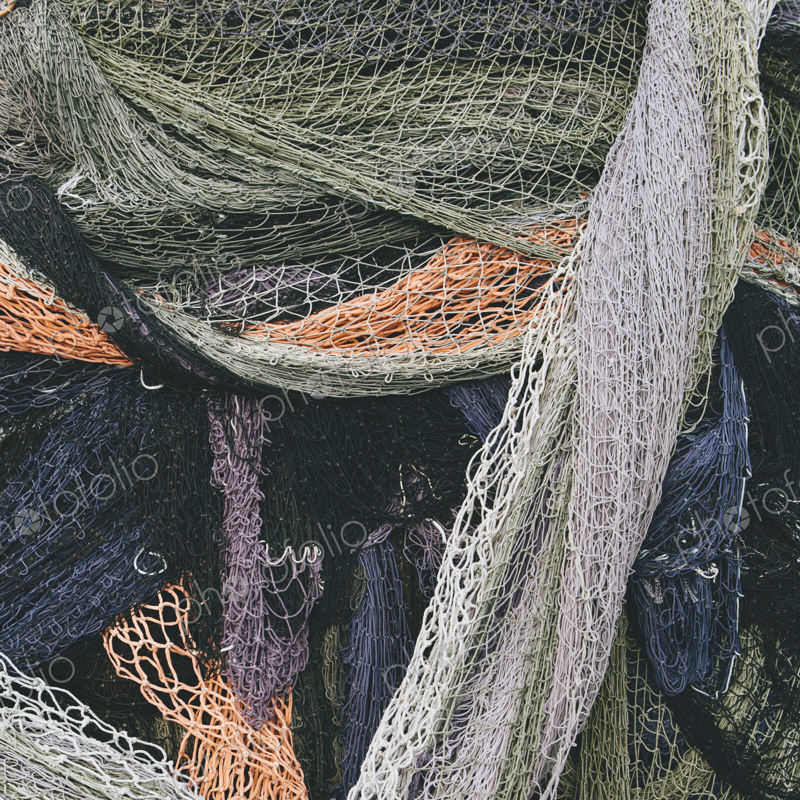 Close up of a pile of tangled up commercial fishing nets.