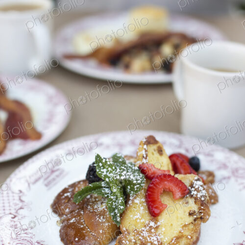 Close up of a plate of food, French toast with berries. Close up of a plate of food, French toast with berries.