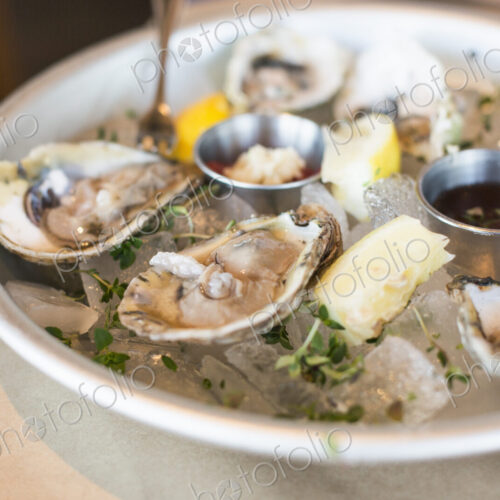 Close up of a plate of fresh oysters. Close up of a plate of fresh oysters.